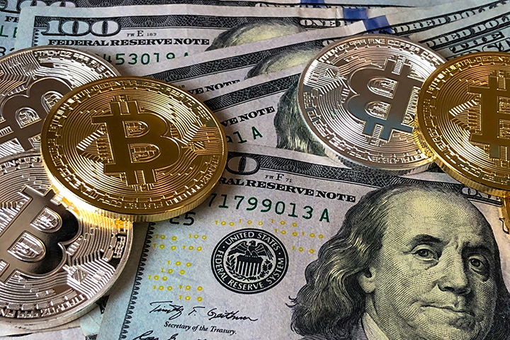 Стоимость биткоина превысила 52 тысячи долларов