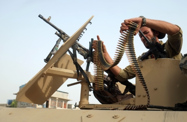 Военнослужащий правительственных войск Афганистана в 7-м районе города Кандагара. Продолжается противостояние с боевиками «Талибана» (движение признано террористическим, запрещено в РФ)