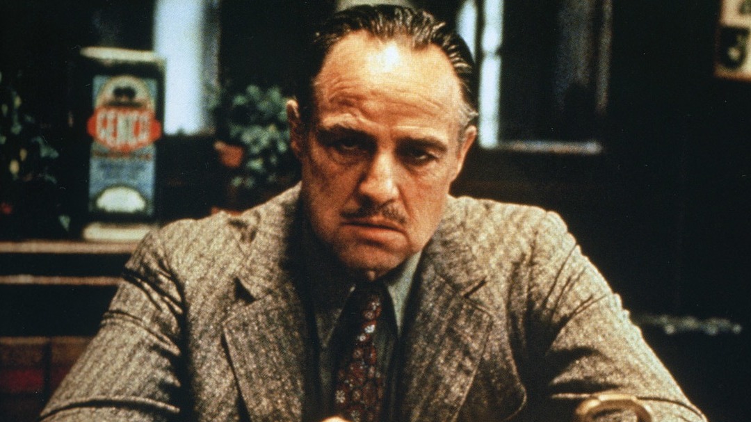 Кадр из американского фильма «Крестный отец» (1972): Марлон Брандо в роли Вито Корлеоне. Прототипами персонажей этого культового фильма были реальные гангстеры, а сюжет отчасти основывается на правдивыхAP/ТАСС, Sakchai Lalit/AP/ТАСС, Mark Lennihan/AP/ТАСС, Frank Worth/ZUMA/ТАСС, Personastars историях 