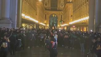 Церемония встречи олимпийского огня прошла в Милане